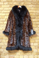 Leopard print mink coat with raccoon trim