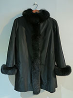 Reversible black sheared mink coat with fox trim