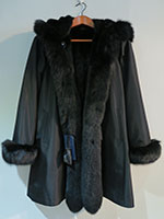 Reversible black full mink coat with fox trim and hood
