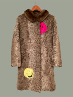 AUp-cycled vintage lamb coat with inset mink smileys and mink collar